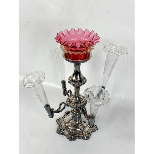 475 - A late Victorian Walker & Hall silver plated epergne with Ruby Glass bowl. 36cm.