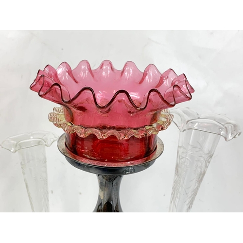 475 - A late Victorian Walker & Hall silver plated epergne with Ruby Glass bowl. 36cm.