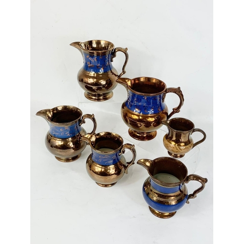 476 - 6 late Victorian lustre pottery jugs. Largest 17 x 14.5cm