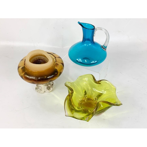 478 - 3 pieces of Art Glass. A green Murano bowl 20.5 x 10.5cm, a blue Art Glass jug 18cm, and an Amber Gl... 