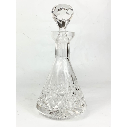 489 - A large Tyrone Crystal vase and a Tyrone heavy crystal decanter. 29cm.