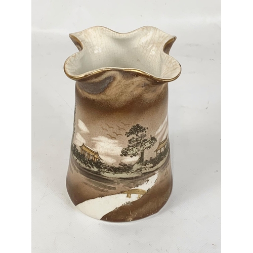 497 - A 1920’s Pountney & Co “Korean Art Ware” vase. Bristol England. 14.5cm.