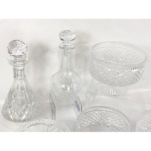 499 - 4 Tyrone crystal bowls, a Tyrone Crystal decanter and another crystal decanter. Largest bowl measure... 