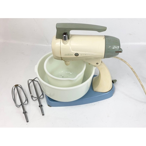 50 - A vintage Sunbeam Mixmaster food mixer..