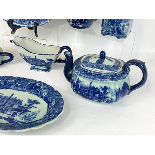 504 - A quantity of Victoria Ware Ironstone blue and white pottery. Teapot measures 24 x 14cm. Platters me... 