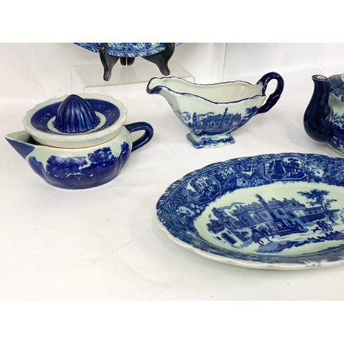 504 - A quantity of Victoria Ware Ironstone blue and white pottery. Teapot measures 24 x 14cm. Platters me... 