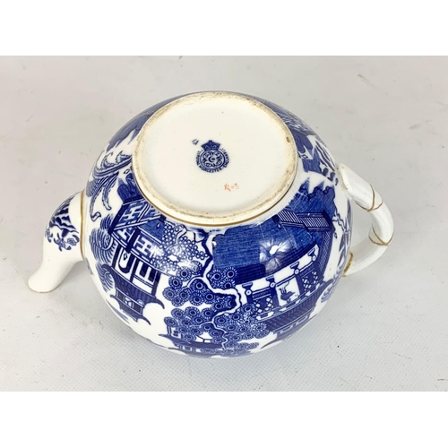 506 - A late Victorian Royal Worcester “Chinoiserie” pattern teapot. Circa 1881. 18 x 13cm.