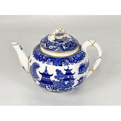 506 - A late Victorian Royal Worcester “Chinoiserie” pattern teapot. Circa 1881. 18 x 13cm.