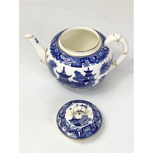 506 - A late Victorian Royal Worcester “Chinoiserie” pattern teapot. Circa 1881. 18 x 13cm.