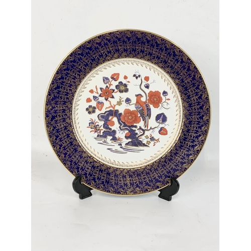 514 - 4 Aynsley pottery collectors plates. 27cm