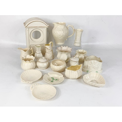 515 - A quantity of Belleek pottery. Green, brown and blue stamps.