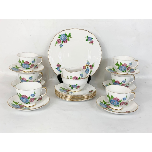 517 - A 21 piece Crown Regent tea set.