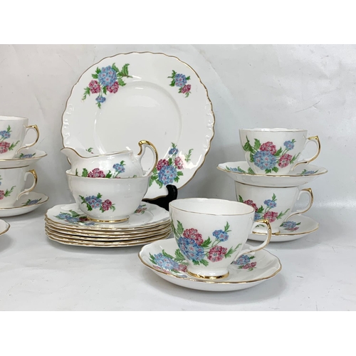 517 - A 21 piece Crown Regent tea set.