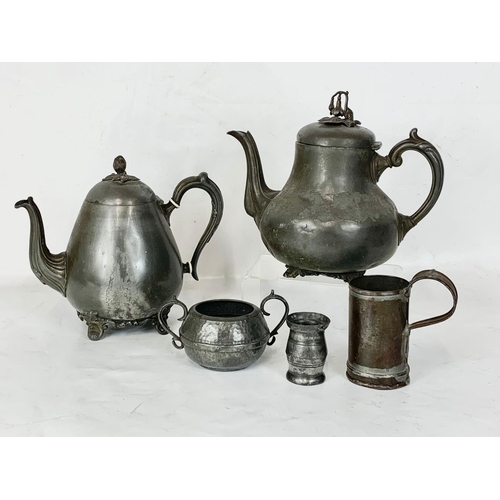 518 - 5 pieces of early 19th century pewter ware. Including a H. G. Long & Co LTD kettle 26 x 22cm.