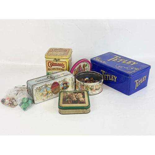 52 - A quantity of vintage tins. Cadbury’s, Tetley, Colman’s, Edward Sharp & Sons.