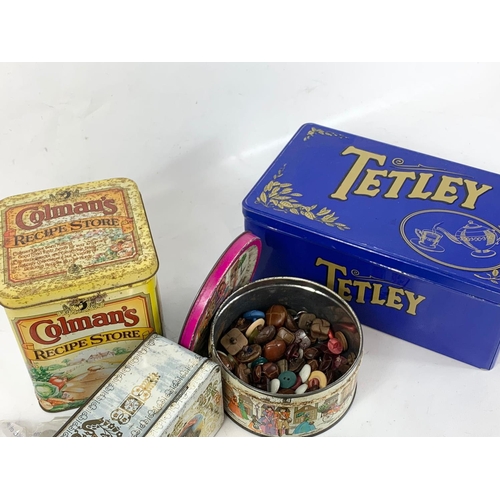 52 - A quantity of vintage tins. Cadbury’s, Tetley, Colman’s, Edward Sharp & Sons.