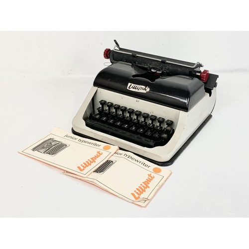 53 - A vintage Lilliput type writer