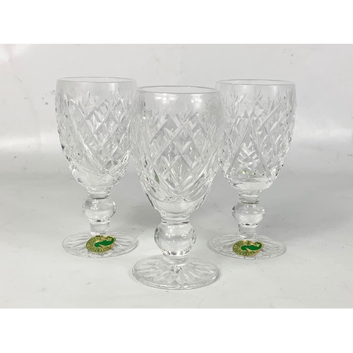 541 - A set of 3 Waterford crystal sherry glasses in box.