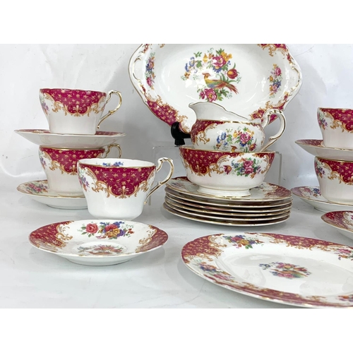 550 - A 22 piece Paragon “Rockingham” tea set.