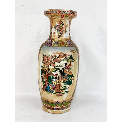 555 - A large Japanese pottery vase. 46cm