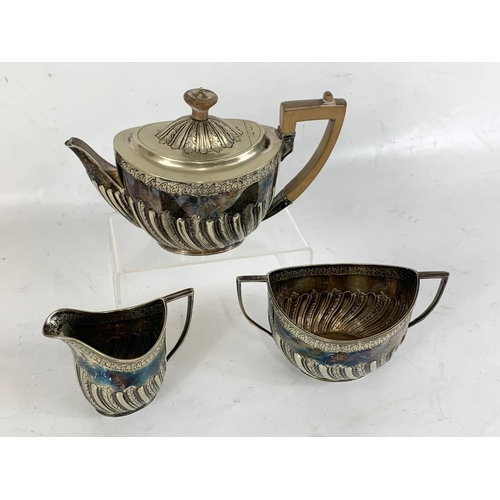 559 - A late 19th century 3 piece silver plated Georgian style tea service.