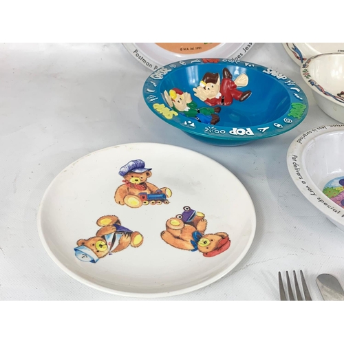 563 - A quantity of vintage children’s dinnerware by Cole & Mason. Snow White, Postman Pat etc.