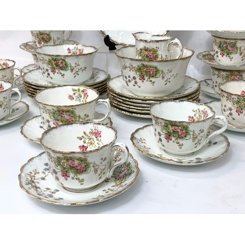 607 - A 40 piece vintage Royal Stafford tea set.