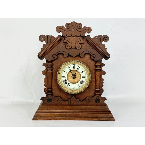 61 - A late 19th century Ansonia Clock Company mantle clock. With key and pendulum. New York. Circa 1880.... 