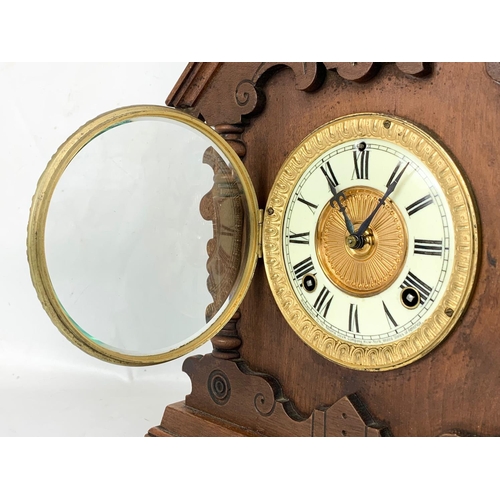 61 - A late 19th century Ansonia Clock Company mantle clock. With key and pendulum. New York. Circa 1880.... 