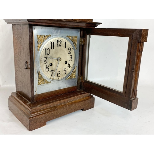 63 - A late 19th century Badische Uhrenfabrik German mantle clock with key and pendulum. 24.5 x 15.5 x 35... 