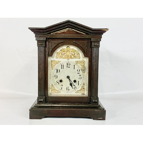 65 - A late 19th century Junghans mantle clock with pendulum. 29 x 17 x 37cm