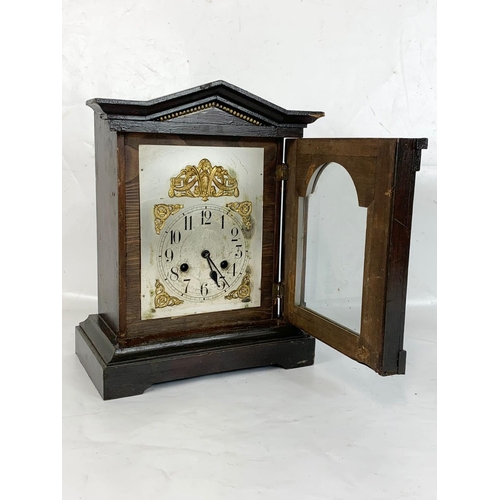 65 - A late 19th century Junghans mantle clock with pendulum. 29 x 17 x 37cm