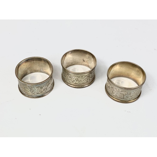 719 - A set of 3 Sterling Silver napkin rings. Birmingham mark, 43gms