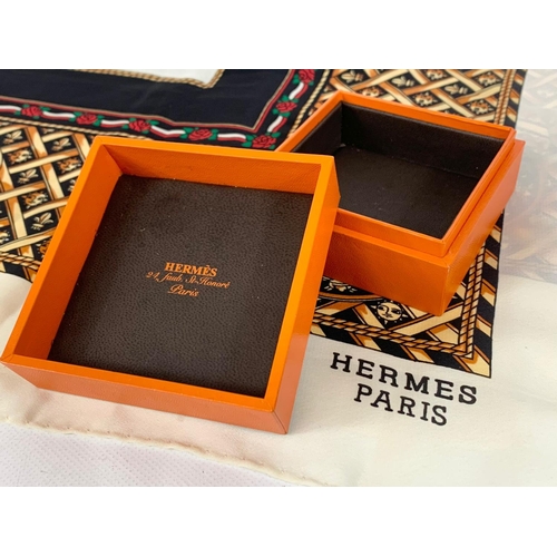 738 - A Hermes silk scarf with box.