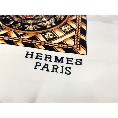 738 - A Hermes silk scarf with box.