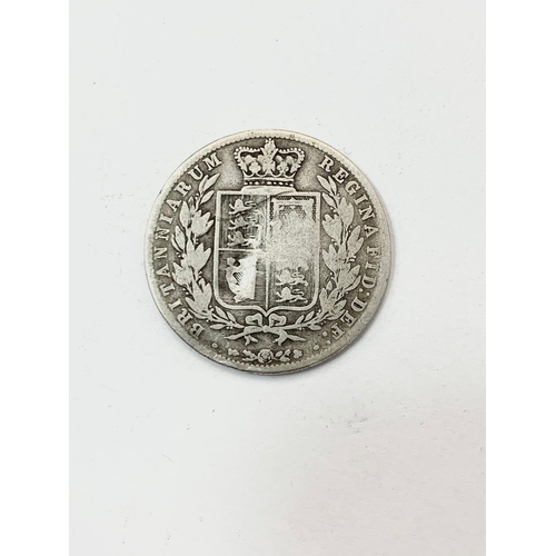 760 - A Victorian silver half crown. 1877.