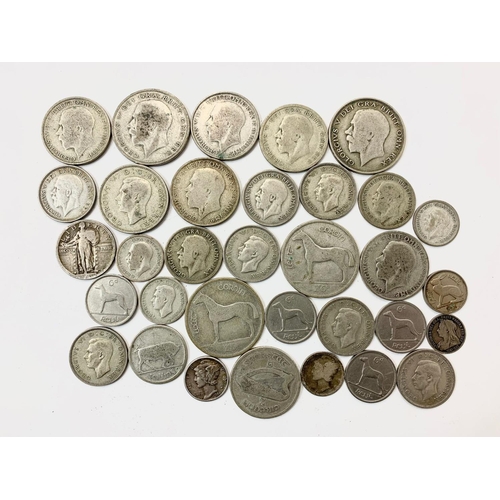 766 - A quantity of silver coins. British and Irish. 230 grams.