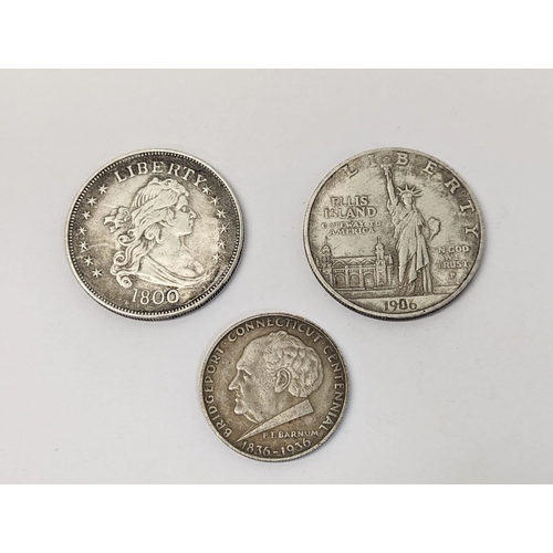 768 - 2 silver dollars 1800 & 1906 with a half dollar 1836-1936