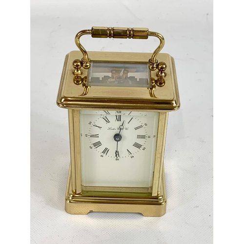 78 - A London Clock Company brass carriage clock with key. French movement.