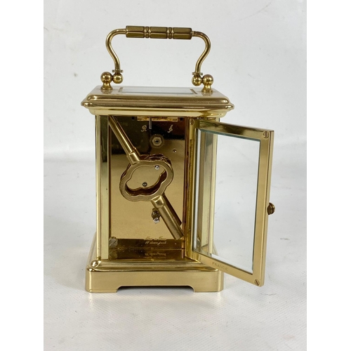 78 - A London Clock Company brass carriage clock with key. French movement.