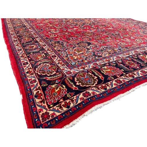 787 - A very large vintage Middle Eastern rug. 296 x 393.