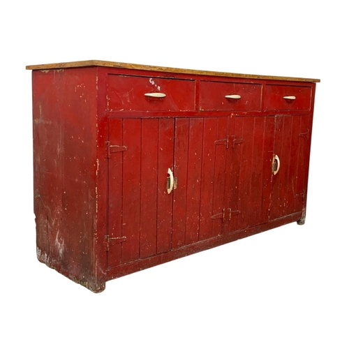 797 - A large Victorian painted pine counter with 3 drawers and 4 door cupboard. Circa 1890. 178 x 58 x 98... 