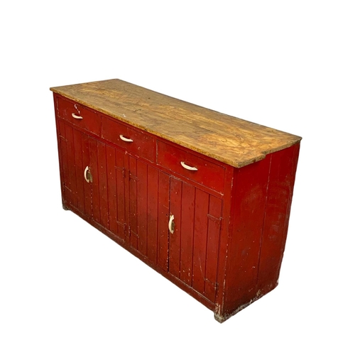 797 - A large Victorian painted pine counter with 3 drawers and 4 door cupboard. Circa 1890. 178 x 58 x 98... 