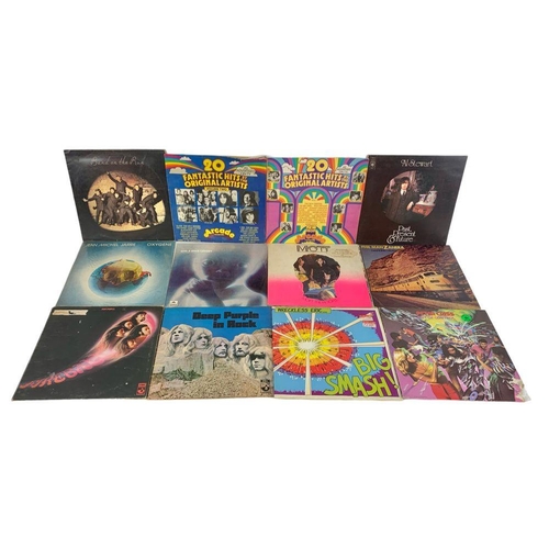 8 - A collection of LP, vinyl records. Band on the Run, Paul McCartney and Wings, 2 Deep Purple albums, ... 