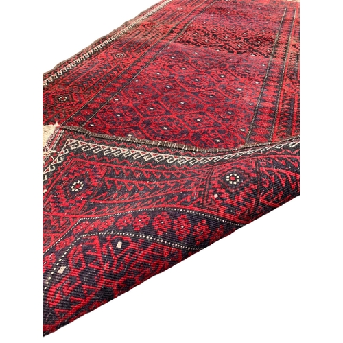 800 - A vintage Middle Eastern hand knotted runner rug. 95 x 218cm