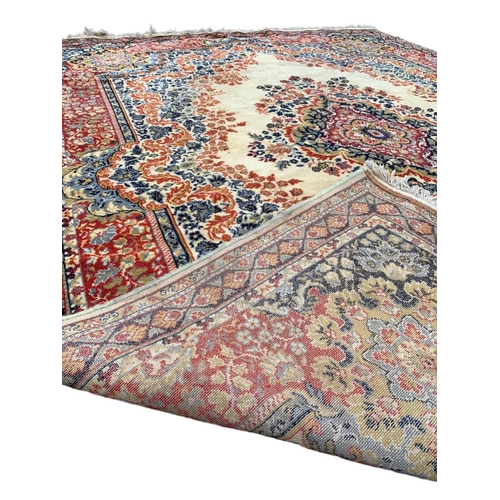 802 - A very large vintage Middle Eastern hand knotted rug. 250 x 334cm.