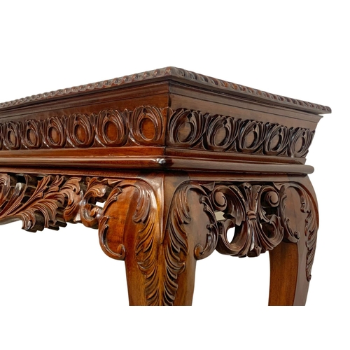 806 - A large Irish Chippendale style carved mahogany console table. 149 x 49 x 100.5cm.