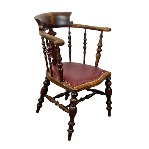 808 - A large Victorian elm and beech armchair with brown vinyl seat. 66 x 52 x 89.5cm.