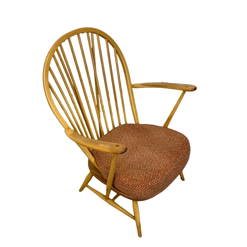 812 - An Ercol Blonde elm Grandfather armchair. Model 317. 74 x 59 x 95cm