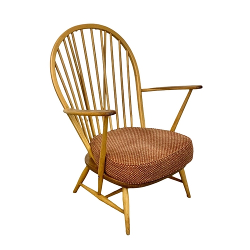 812 - An Ercol Blonde elm Grandfather armchair. Model 317. 74 x 59 x 95cm